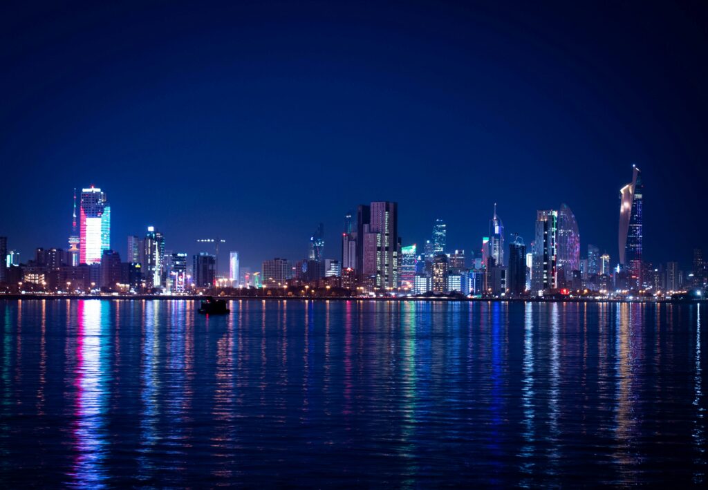 Kuwait City skyline at night across the water
